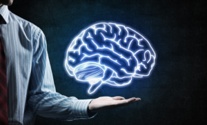 Health Optimization | Lifespan Health 3 Man holding a graphical brain