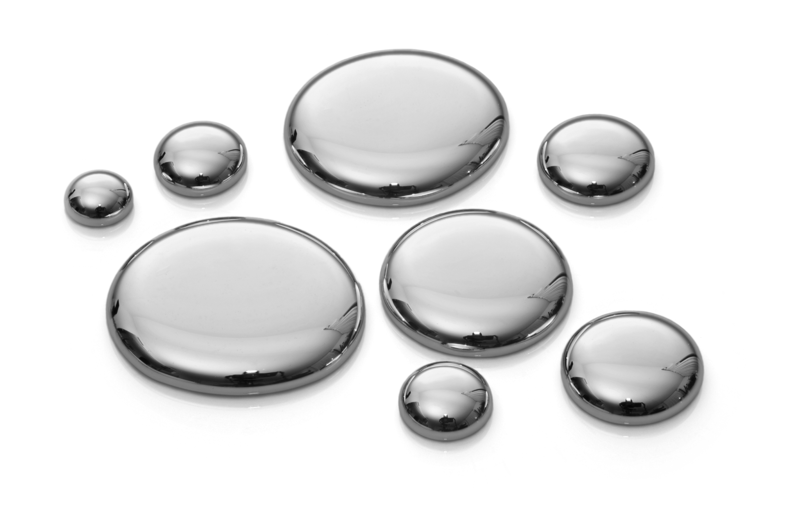 Chelation 2 Drops of mercury on a white background representing chelation therapy