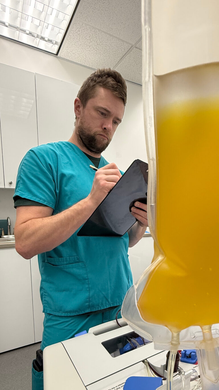 Therapeutic Plasma Exchange 2 Male nurse performing therapeutic plasma exchange