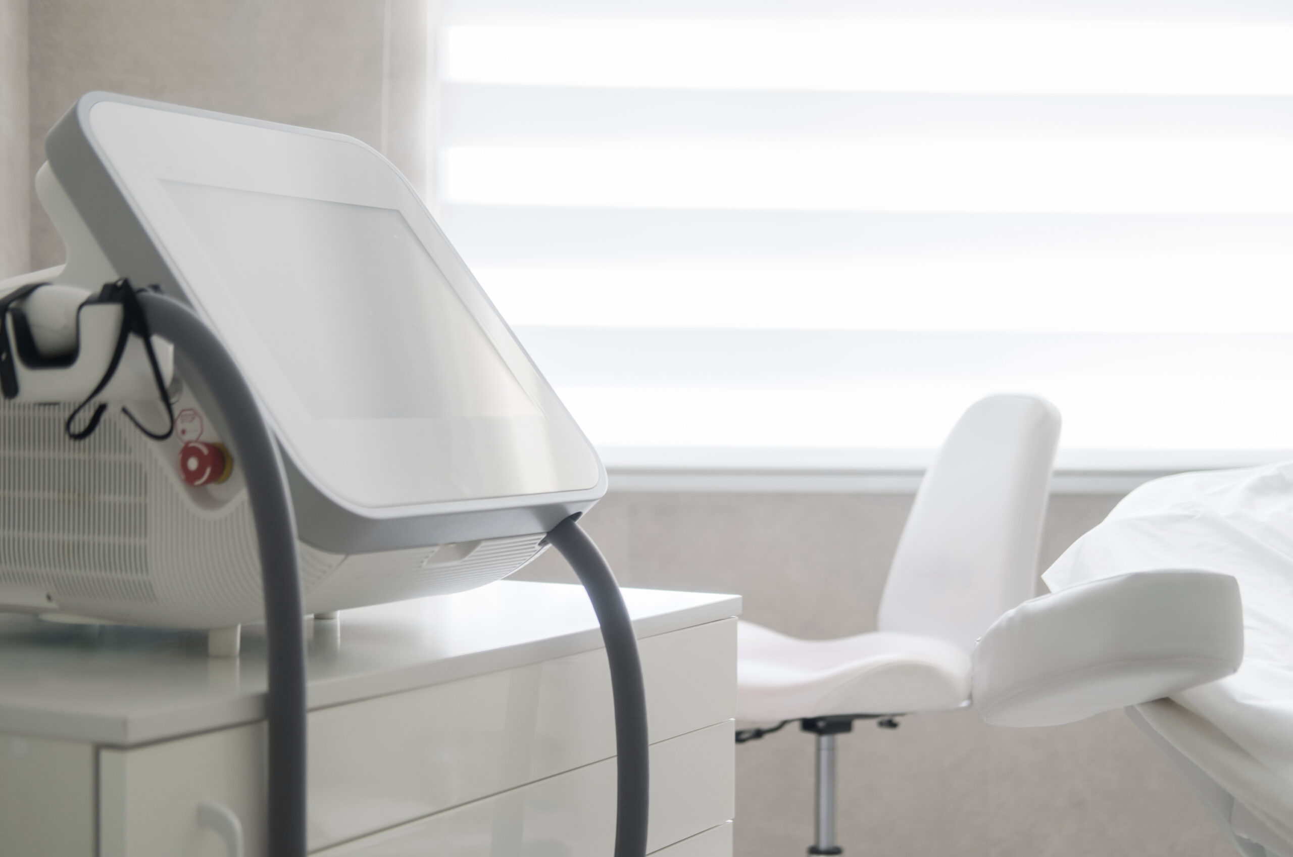 White toned medical therapy machine and bed, representing Lifespan Health Treatments