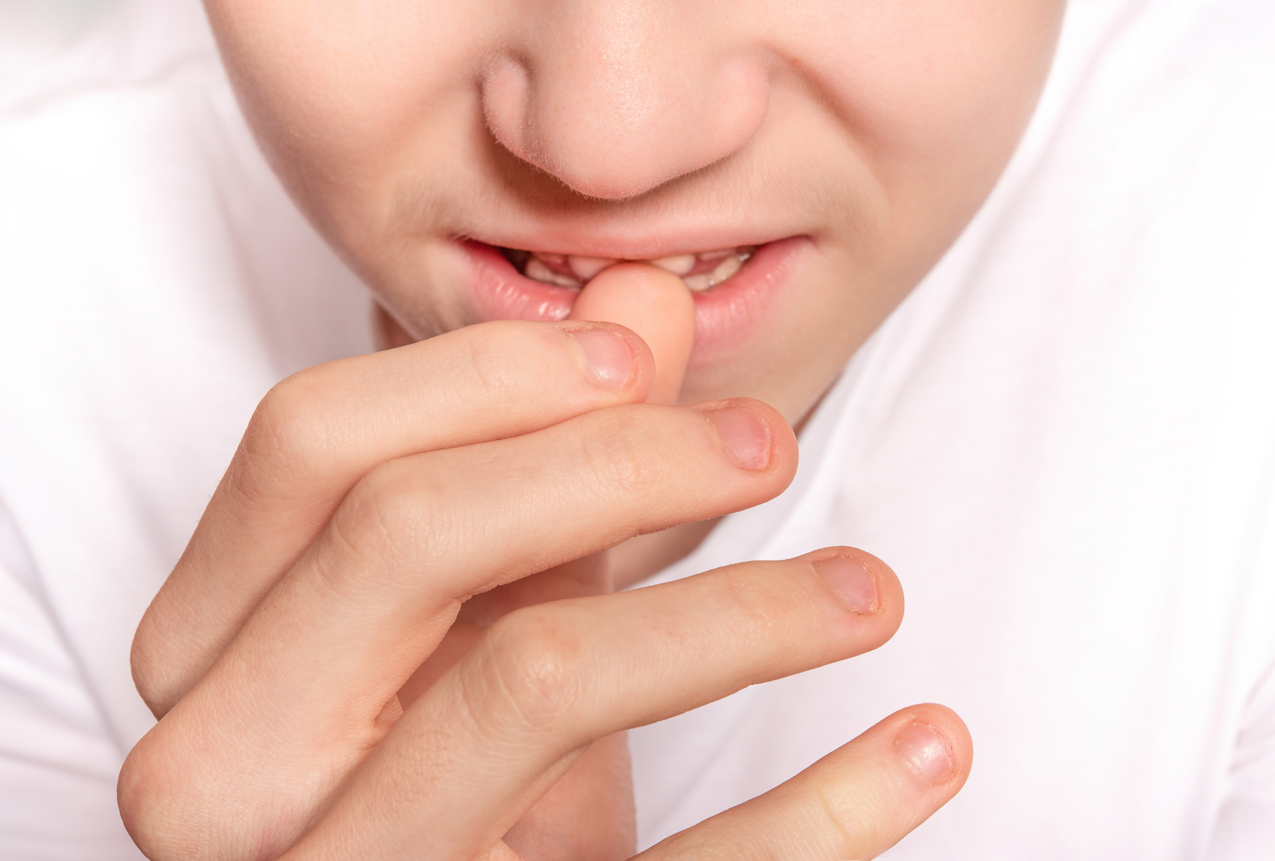 Therapeutic Plasma Exchange for PANS and PANDAS | Lifespan Health 1 Child biting nail, representing PANS and PANDAS