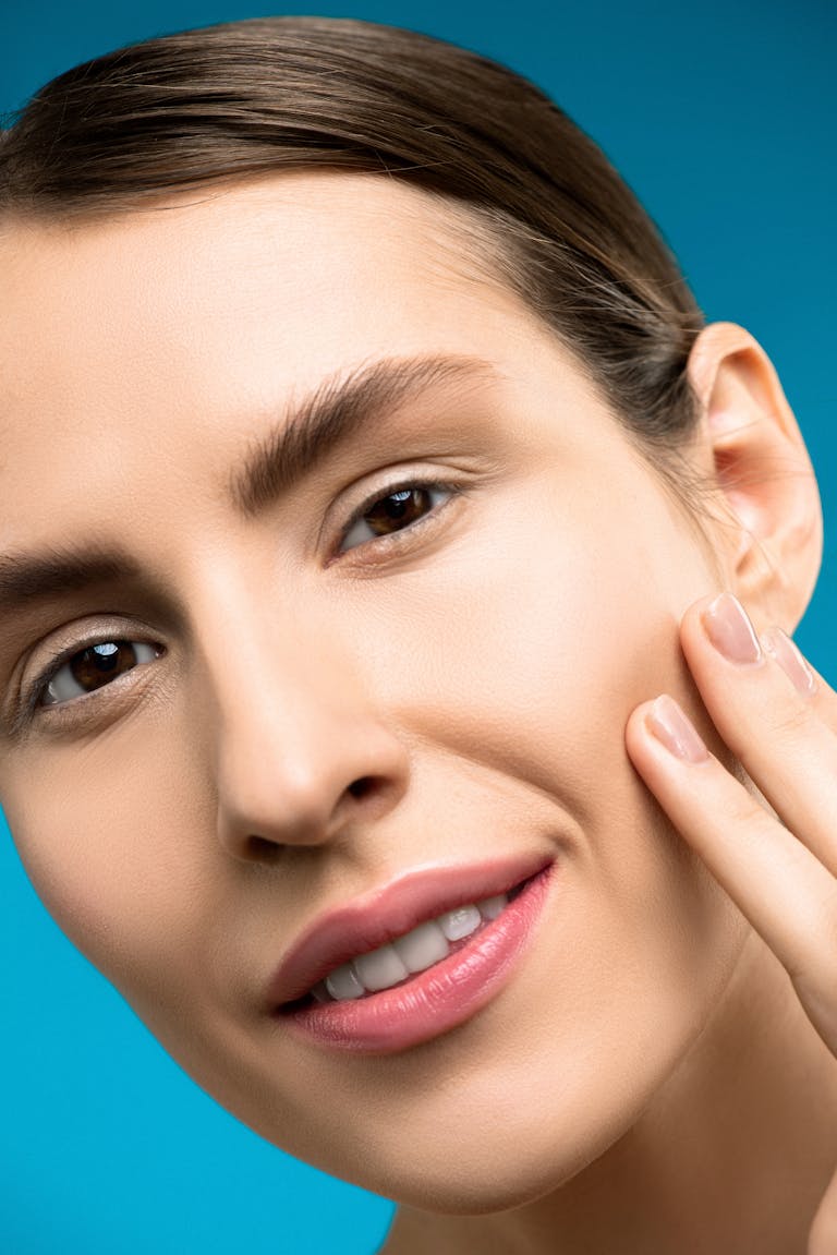 Morpheus8 Advanced Skin Therapy 2 Close-up portrait of smiling woman with clear skin, representing a Morpheus8 treatment